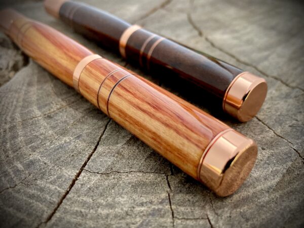 A pair of Copper Banded Fountain Pens