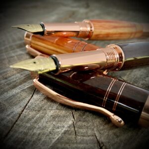 A pair of Copper Banded Fountain Pens